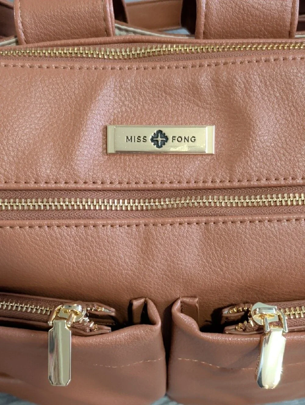 Tan Vegan Leather Baby Diaper Bag Tote Backpack with Multiple Front Pockets